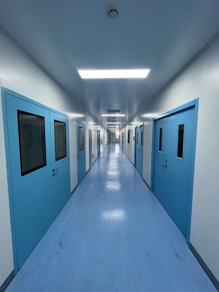 Cleanroom corridor with blue doors in a Jiangsu medical device workshop