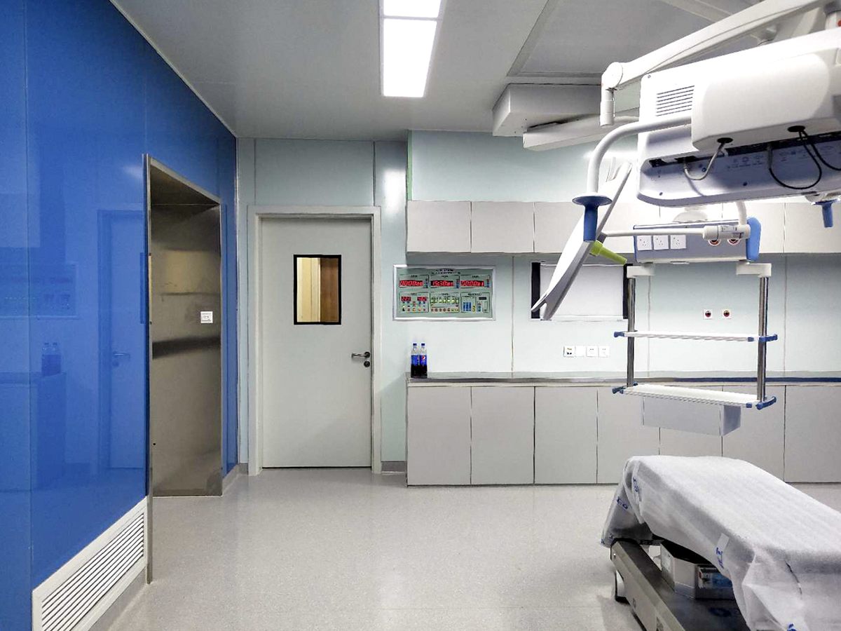 Blue and white hospital room with clinical equipment in a Shanghai hospital project