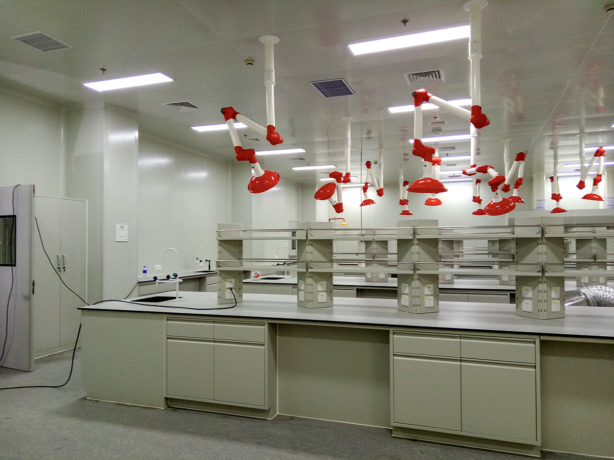 Laboratory benches and red extraction arms in a Shanghai analytical laboratory